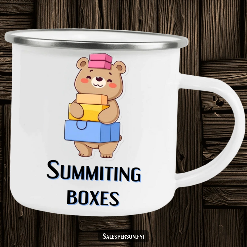 Funny camping mug featuring a confident bear balancing a stack of colorful boxes, perfect for adventurous drinkers.