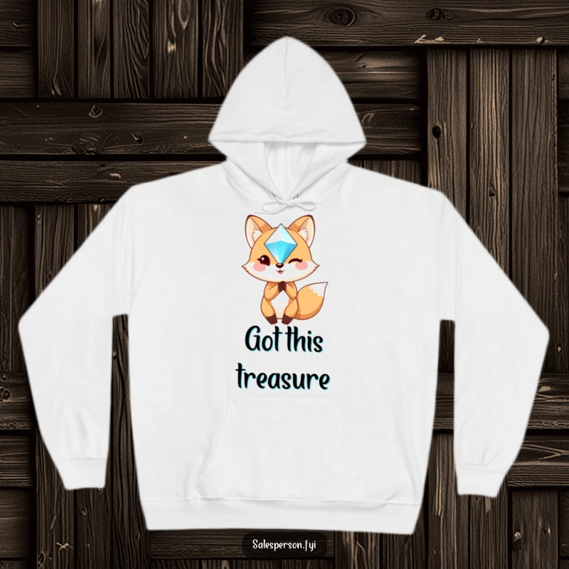 Funny Fox Hoodie: A charming fox winks confidently while holding a glittering gem, perfect for cozy, witty style.