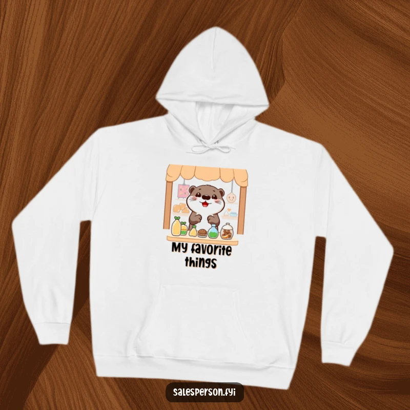 Funny Otter Hoodie: A cheerful otter gesturing widely towards enticing items, perfect for cozy, happy shoppers.