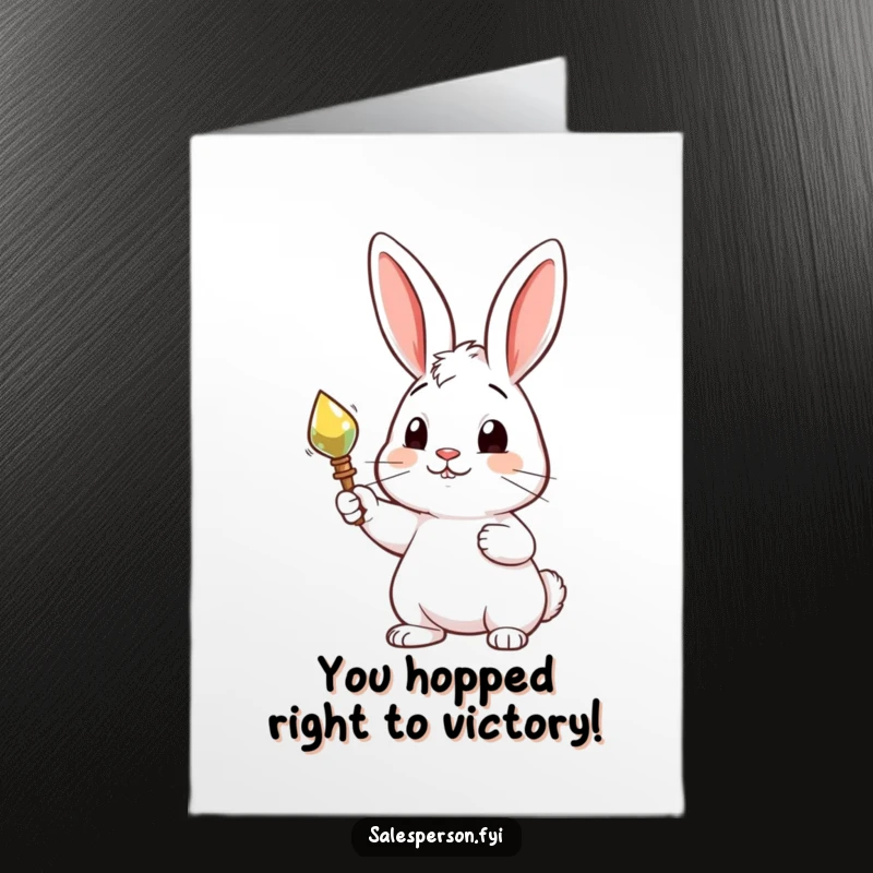 Printable Congratulations Card: A curious rabbit proudly holds up a shiny object, celebrating an achievement.